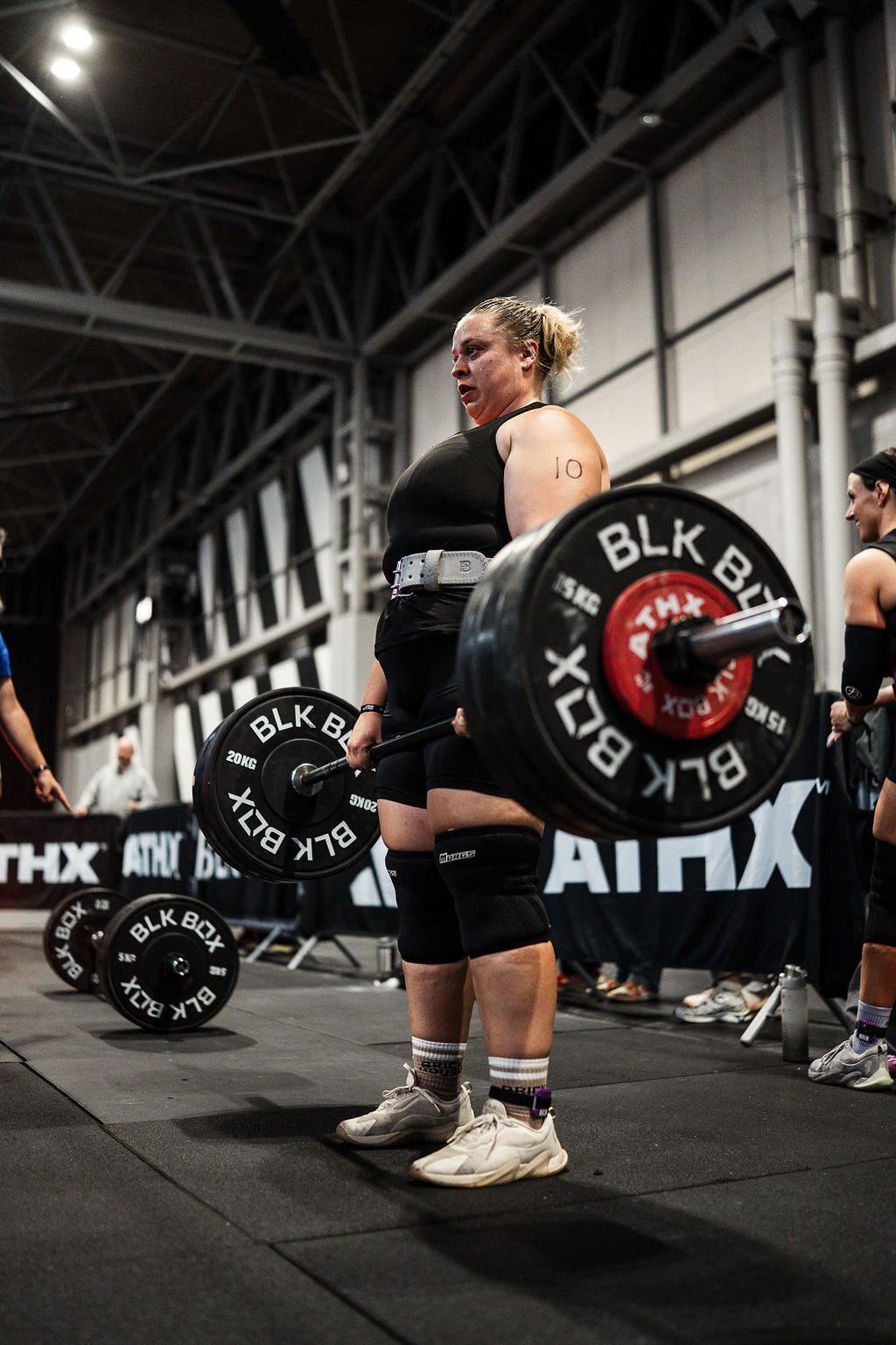 An athlete deadlifts a heavy barbell in the Strength Zone